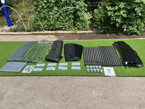 Trampolín para jardín con red negra, cierre amarillo y cobertor multicolor